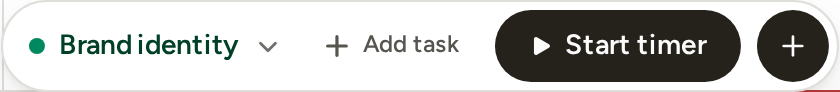 The dock idle at the foot of the calendar: a project picker, Add task, Start timer and the plus.