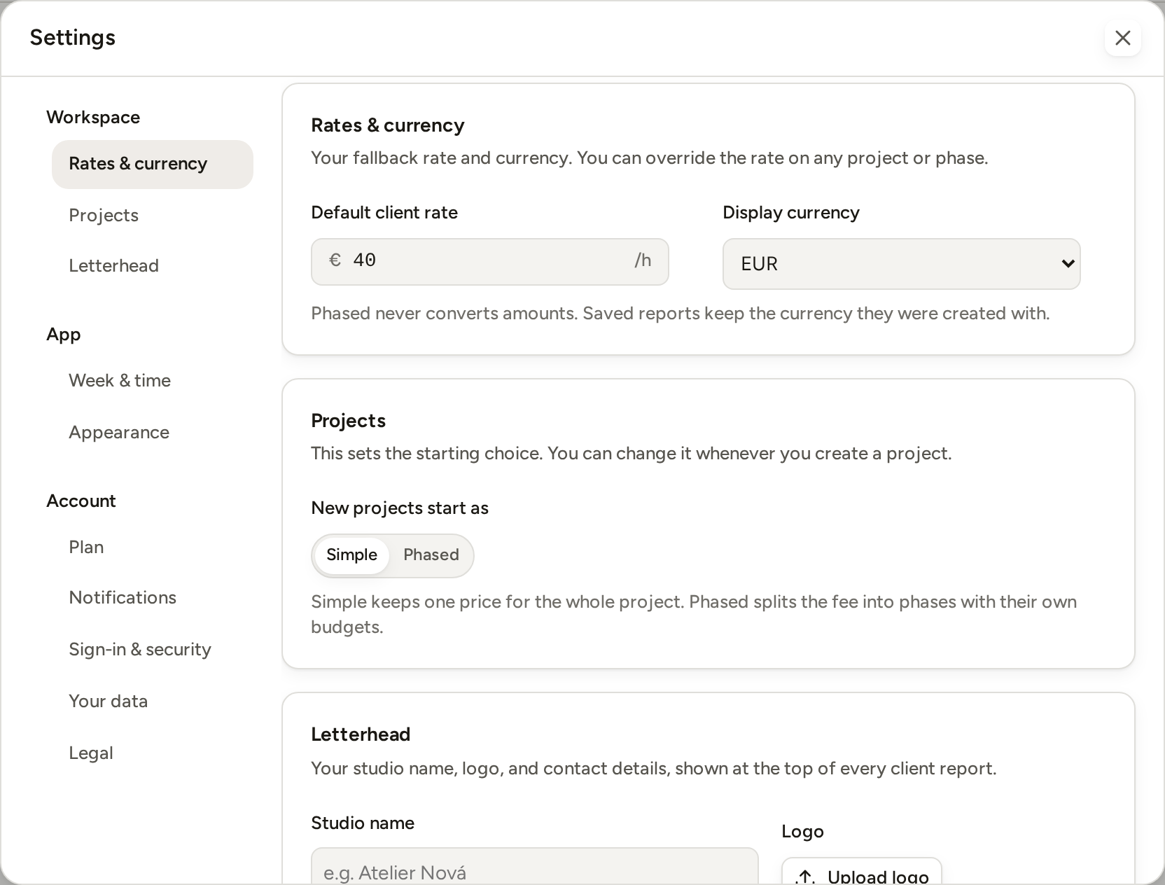 Settings open on Rates and currency: the default rate and the display currency, with the section list on the left.